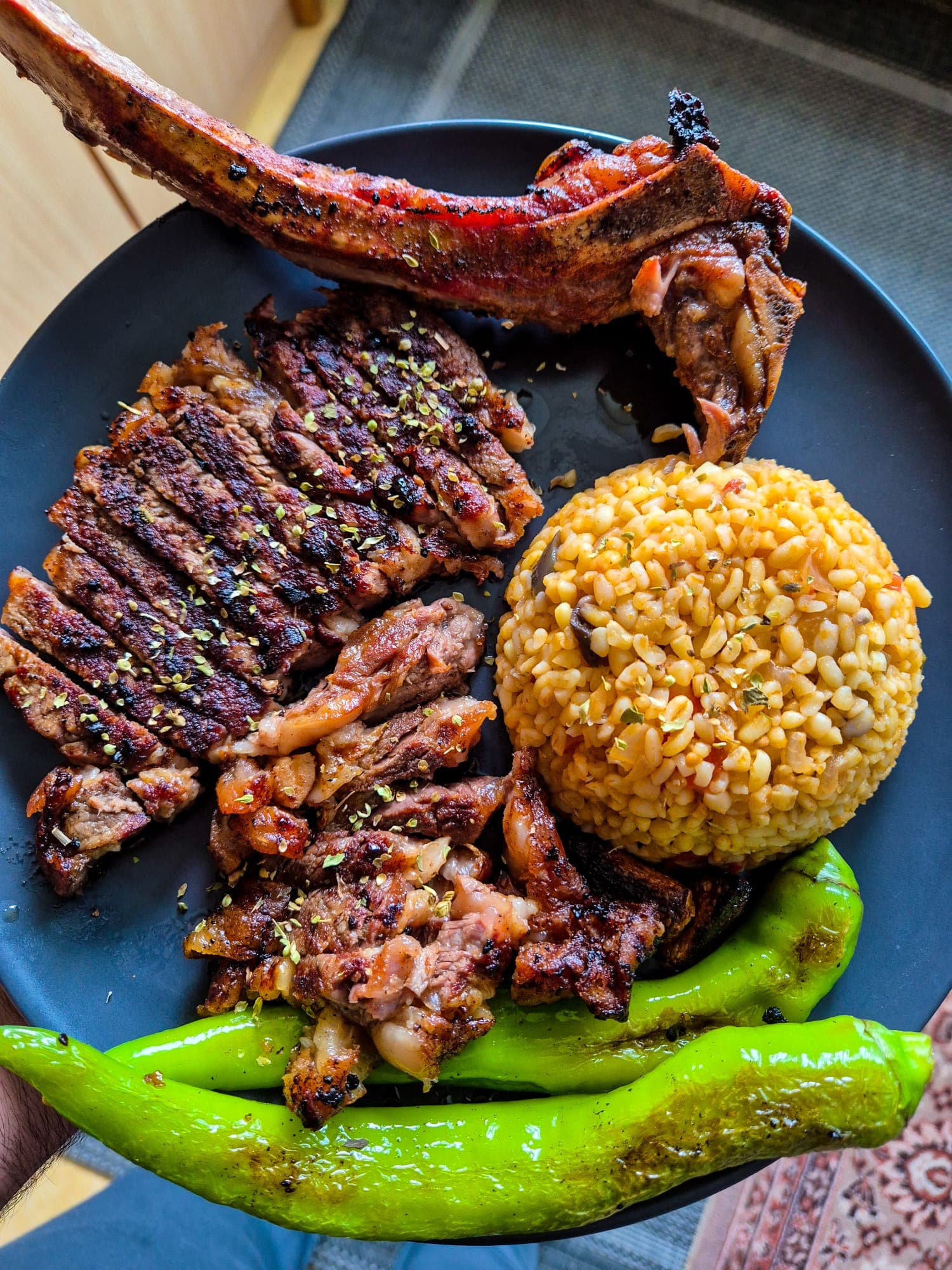 Grilled meat and vegetables on a plate after gym session