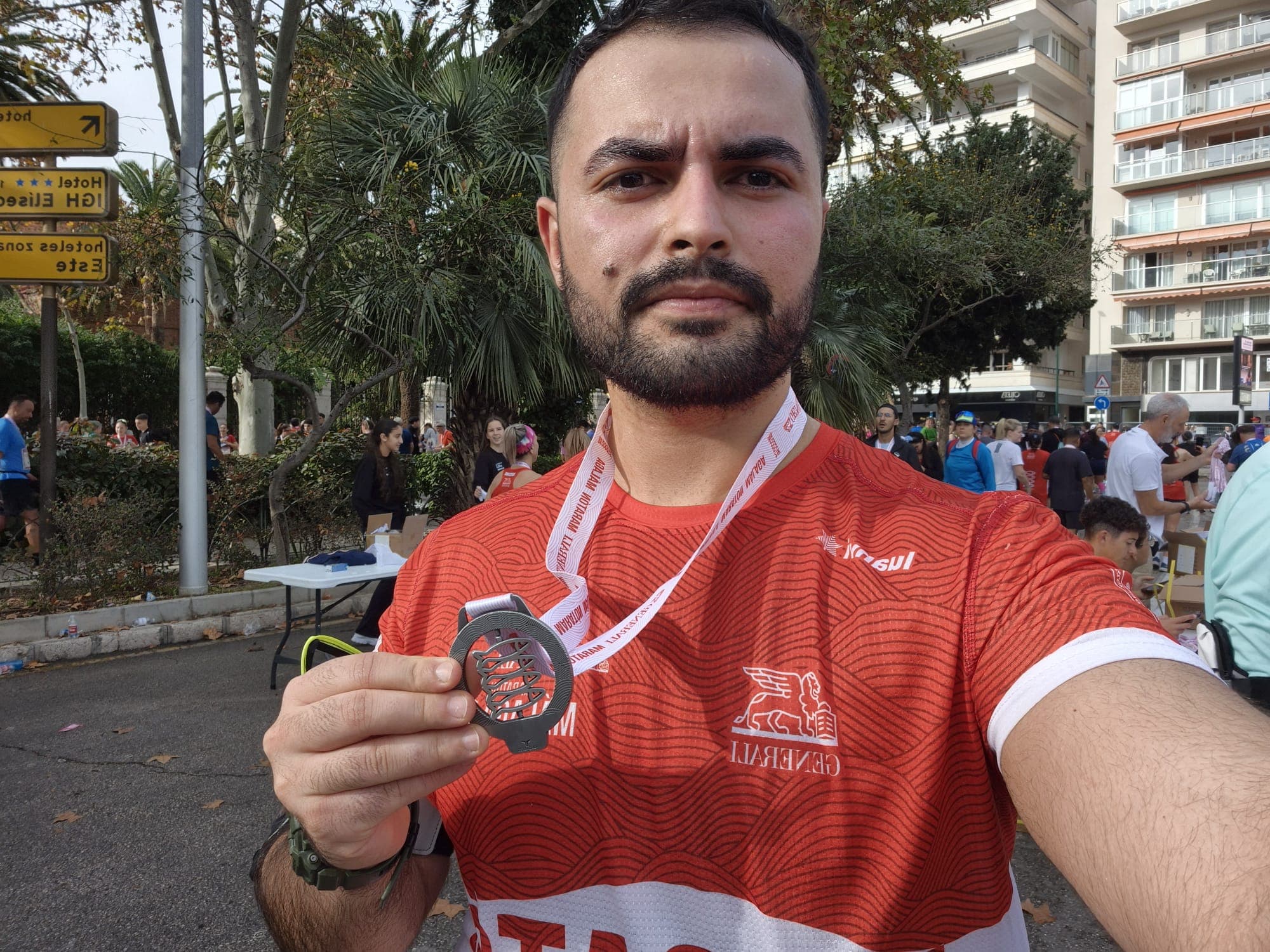 Alpi smiling after finishing the Málaga half marathon.